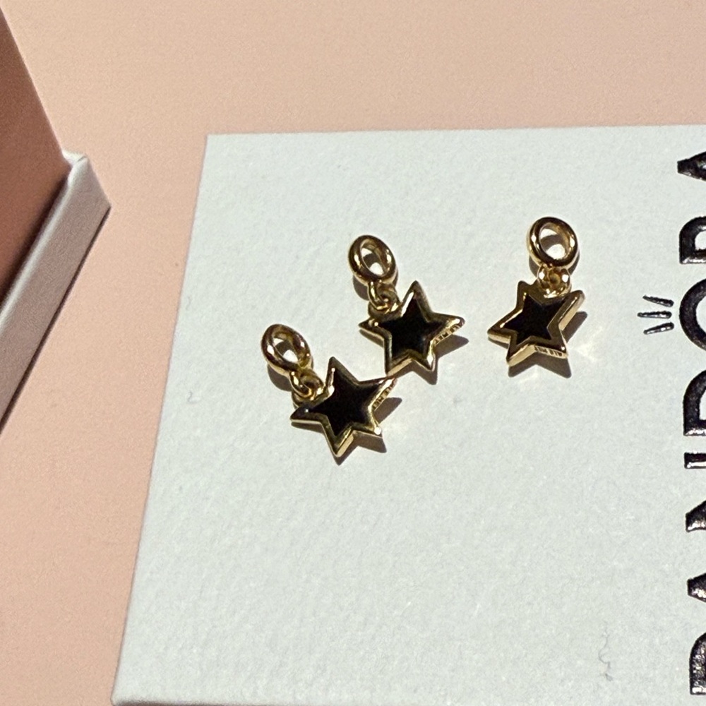 Pandora Me Gold and Black Star Charms